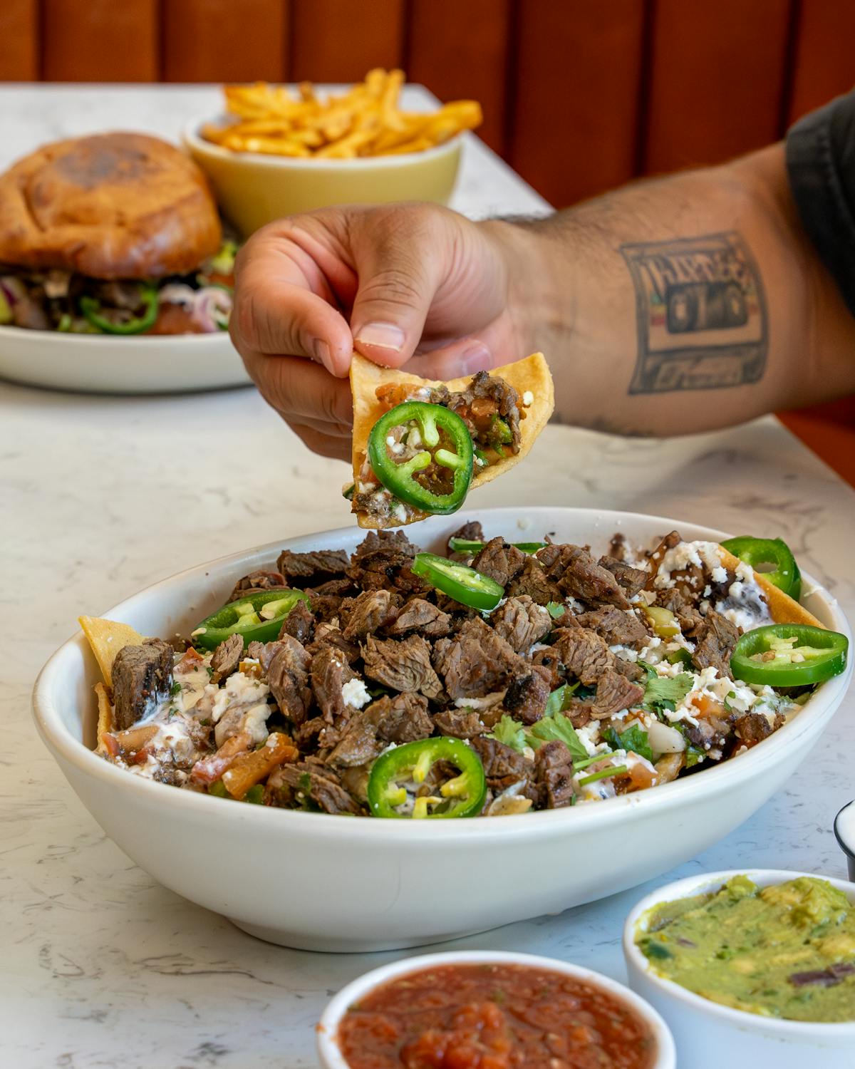 a bowl of food on a plate on a table